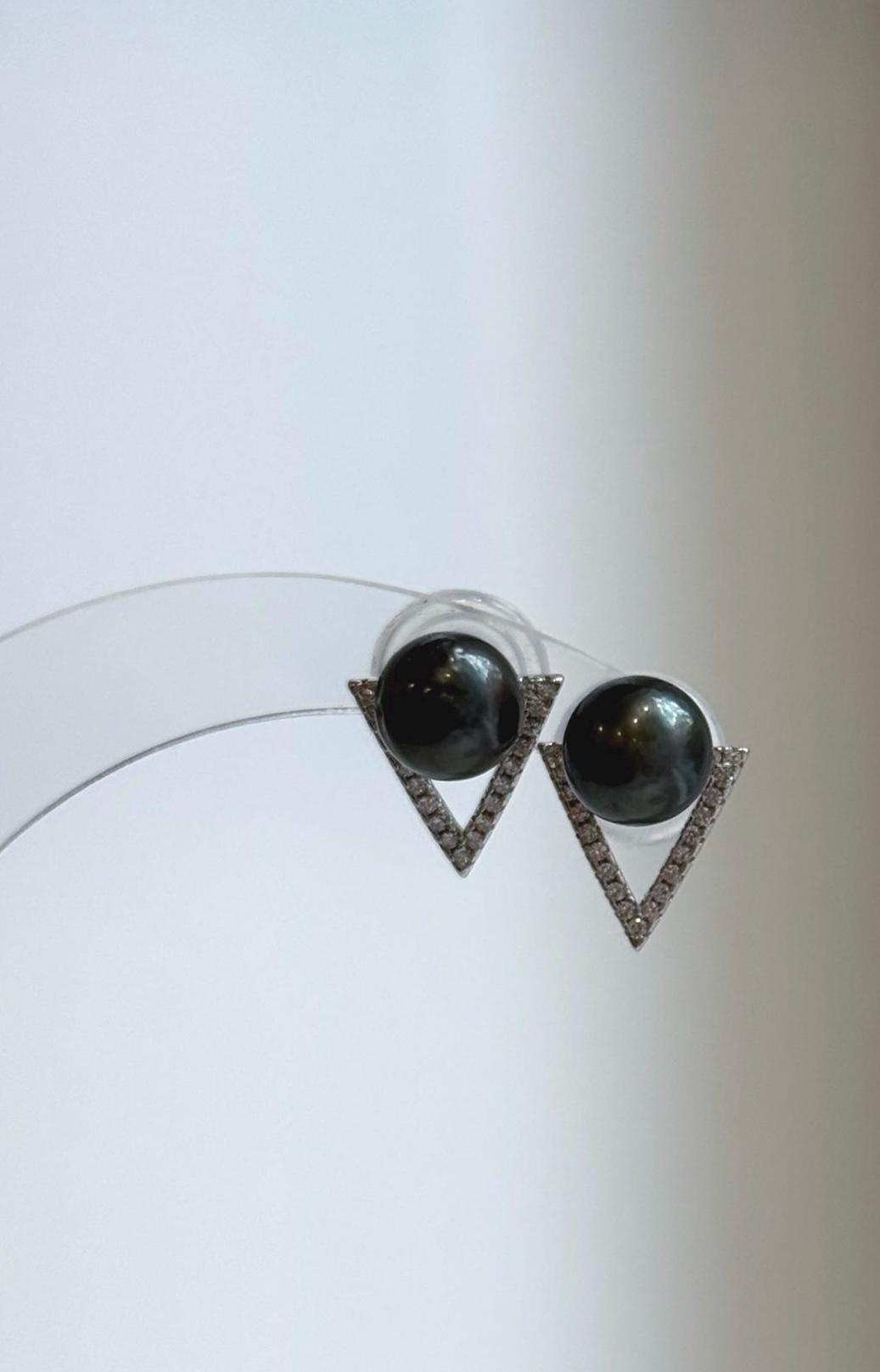 S925 sterling silver earrings featuring dark pearls and crystal accents.