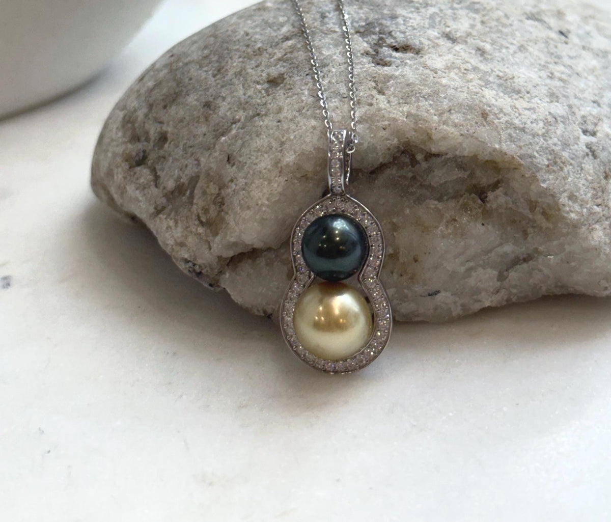 Gourd pendant featuring two genuine saltwater pearls and S925 silver.
