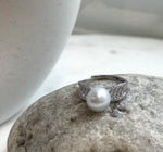 White Australian ocean pearl with silvery reflections in an S925 sterling silver setting.