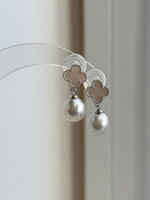 Australian silver-white South Sea pearl drop earrings with clover sterling silver settings.
