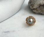 Genuine Tahitian saltwater pearl in a floral gold-plated S925 silver ring.