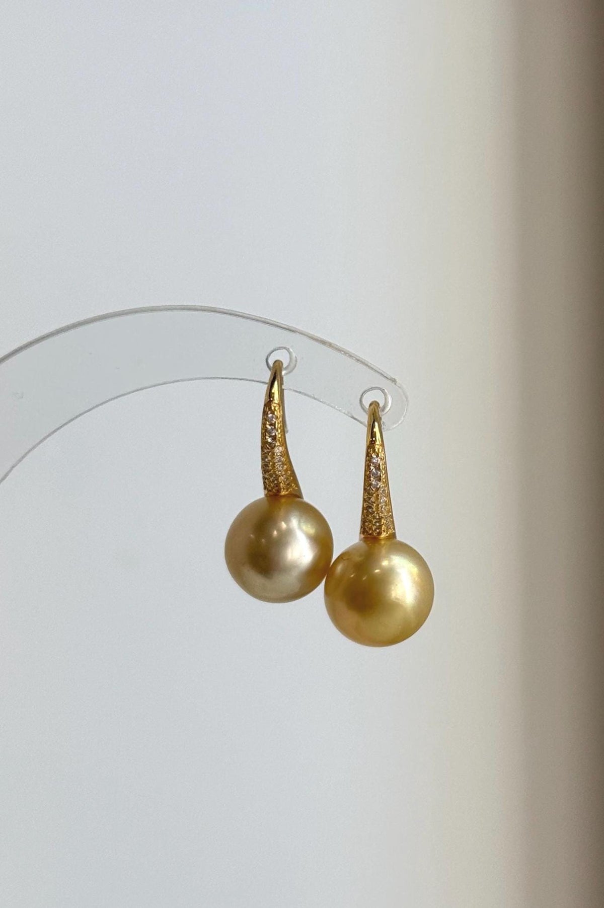 South Sea saltwater pearl earrings with high-heel inspired sterling silver hooks.