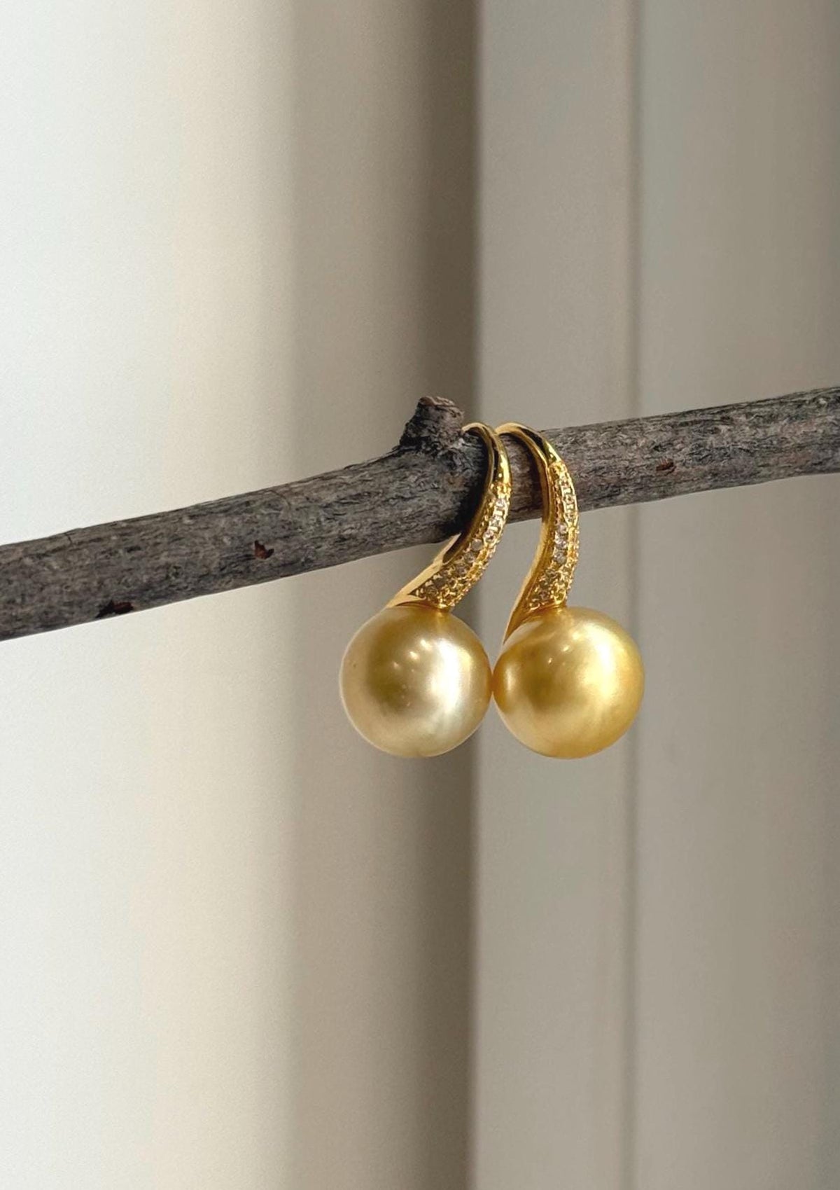 South Sea saltwater pearl earrings with high-heel inspired sterling silver hooks.