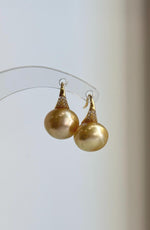 South Sea saltwater pearl earrings with high-heel inspired sterling silver settings.