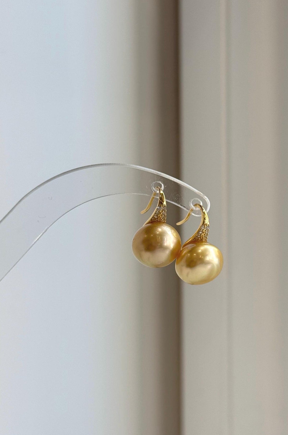 Deep tea gold South Sea pearls paired with high-heel inspired S925 sterling silver hooks.