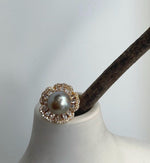 Tahitian pearl floral ring combining taupe coloring with warm gold tones.