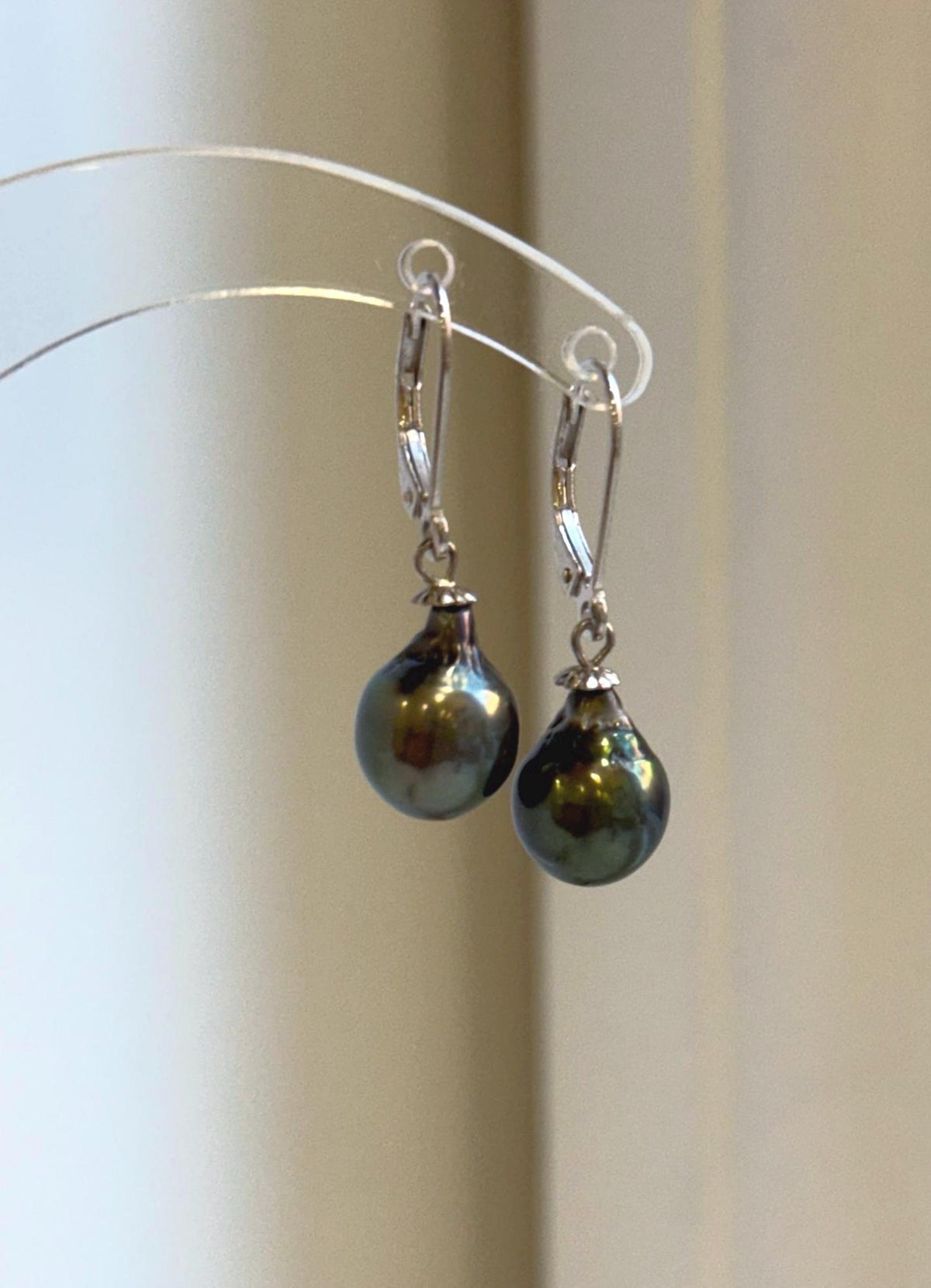 Peacock green Tahitian pearl earrings with S925 sterling silver leverback hooks.
