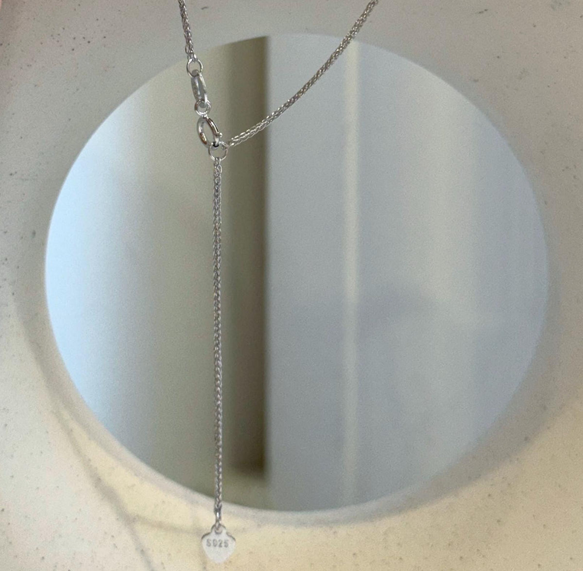 Double pearl necklace pairing reflective Tahitian pearls with sterling silver.
