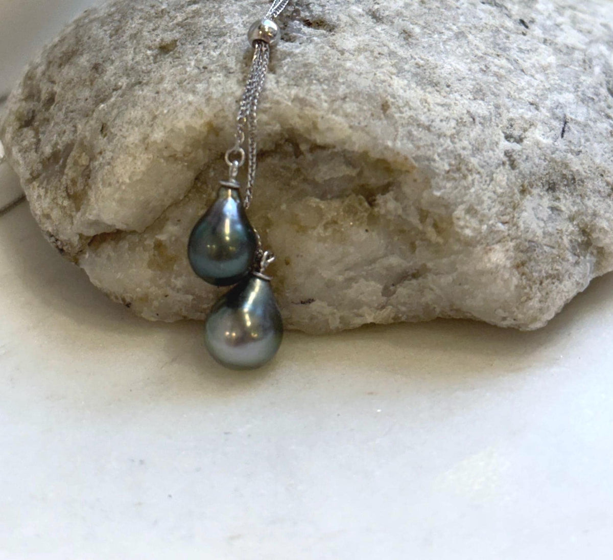 Double pearl pendant featuring lustrous Tahitian pearls in S925 sterling silver.