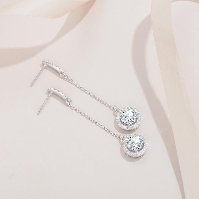 S925 sterling silver dangle earrings featuring stone-set tops and round halo pendants.