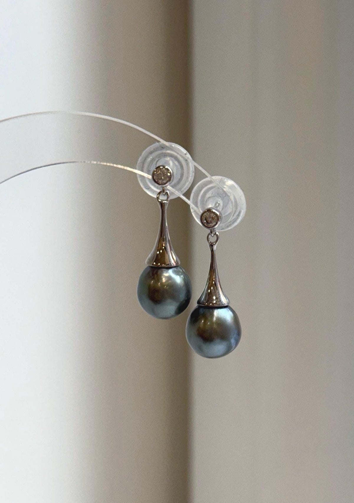 Gray pearl drop earrings with mirror luster