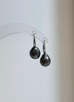 Platinum gray pearl earrings with reflective luster