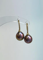 Coordinating raspberry rose pearl necklace and sterling silver hook earrings.