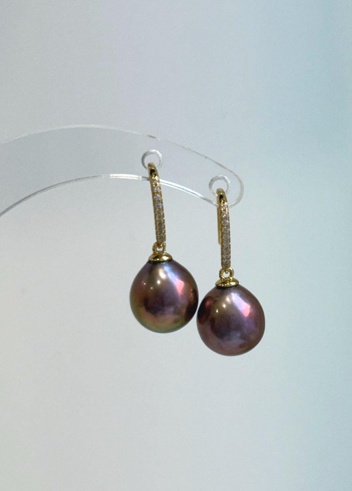 Coordinating raspberry rose pearl necklace and sterling silver hook earrings.
