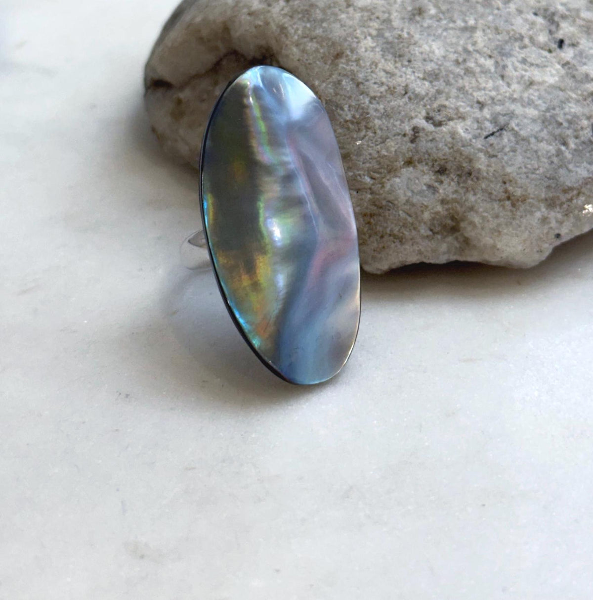 Ocean mabe pearl ring with rainbow overtones