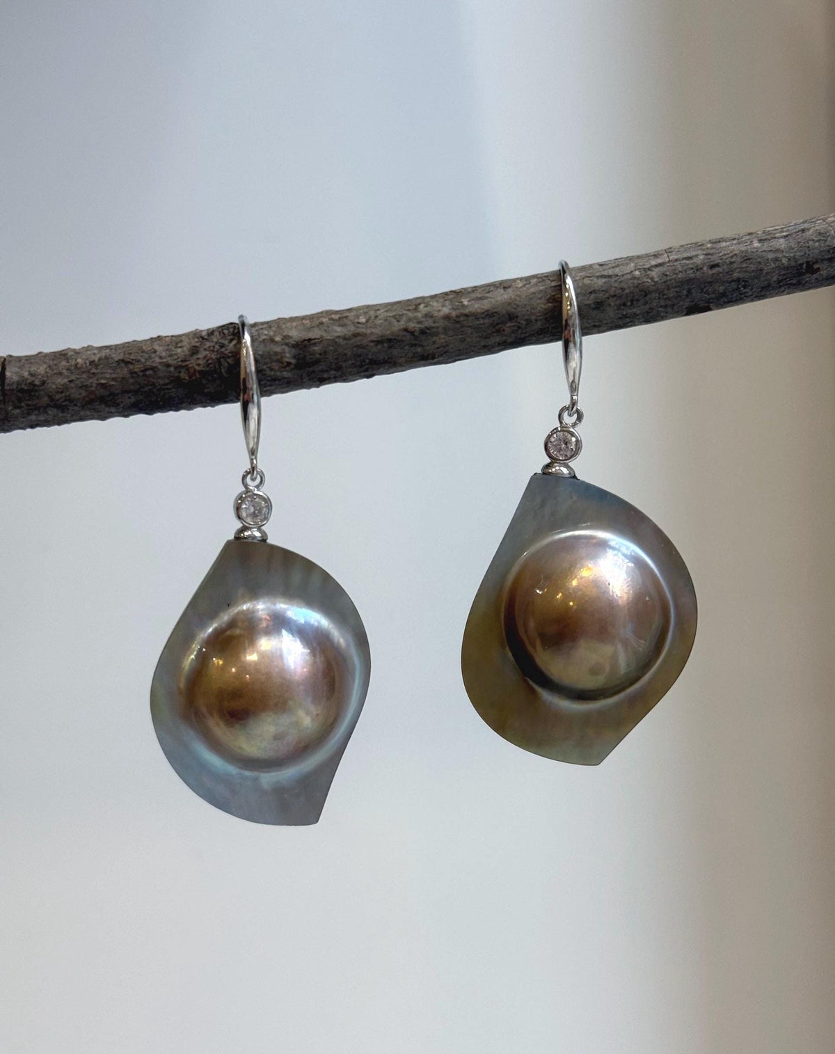 Elly’s rainbow golden mabe pearl drop earrings in S925 silver.