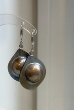 S925 silver earrings showcasing mirror-luster golden mabe pearls.