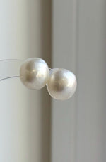 Classic Australian South Sea pearl earrings with soft white tones and bright luster.