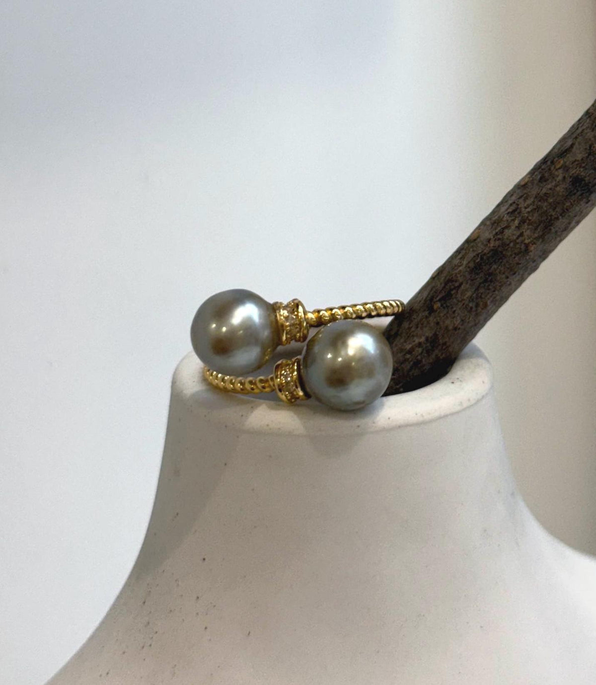 Double taupe Tahitian pearl ring with mirror luster and an adjustable sterling silver band.