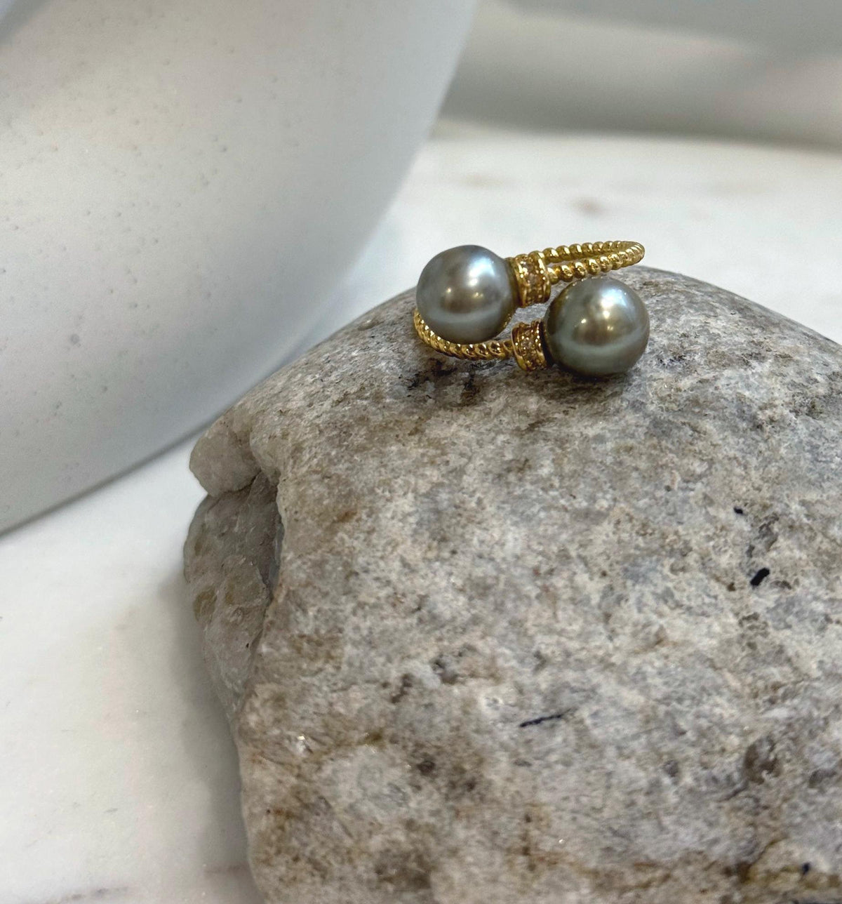 Taupe Tahitian pearl ring featuring two lustrous pearls and an adjustable silver band.