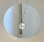 Australian South Sea pearl pendant featuring a lustrous white pearl with silver overtones and an S925 sterling silver setting.