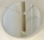 Australian pearl pendant featuring silver overtones across a luminous white pearl surface.