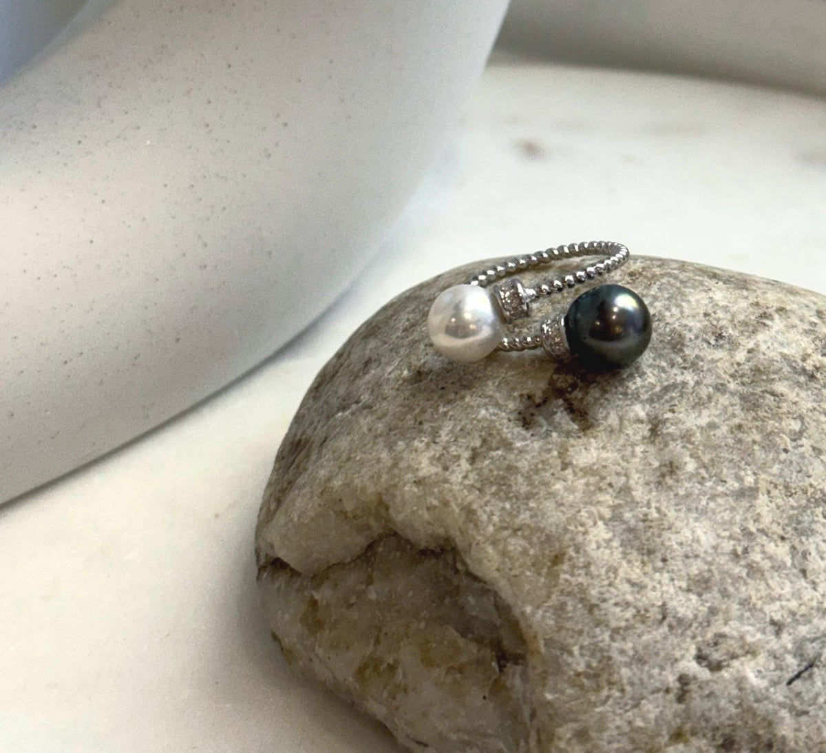 Tahitian and freshwater pearls paired in a simple adjustable silver ring.