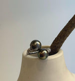 Double Tahitian pearl ring with an adjustable sterling silver band.