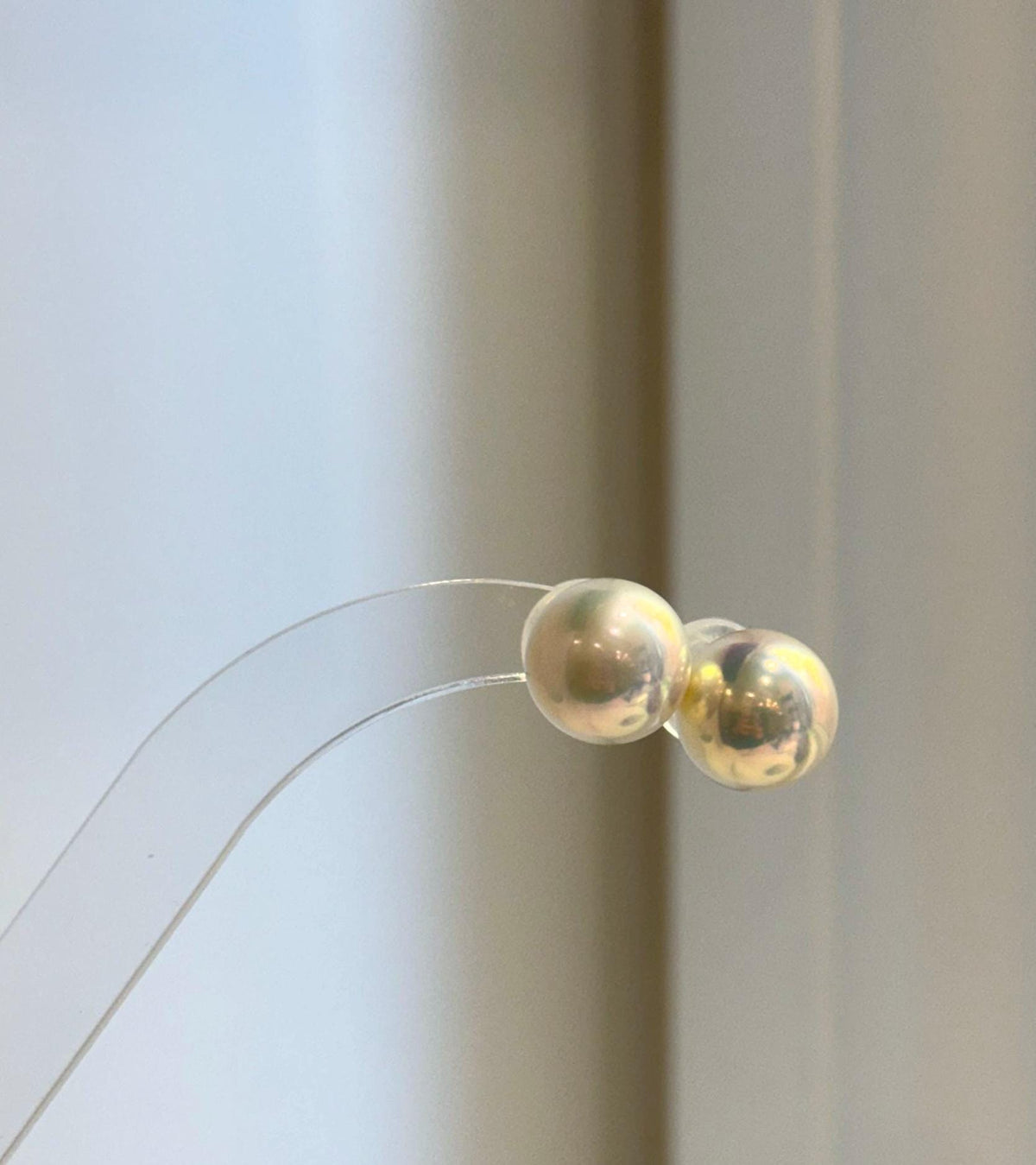 S925 sterling silver studs featuring champagne gold Edison pearls