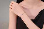 Elegant moissanite bracelet with a delicate silver chain