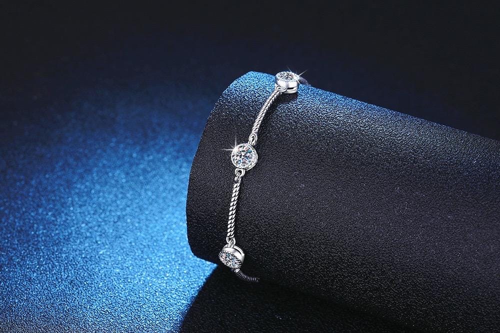 S925 sterling silver bracelet with three round moissanite stones