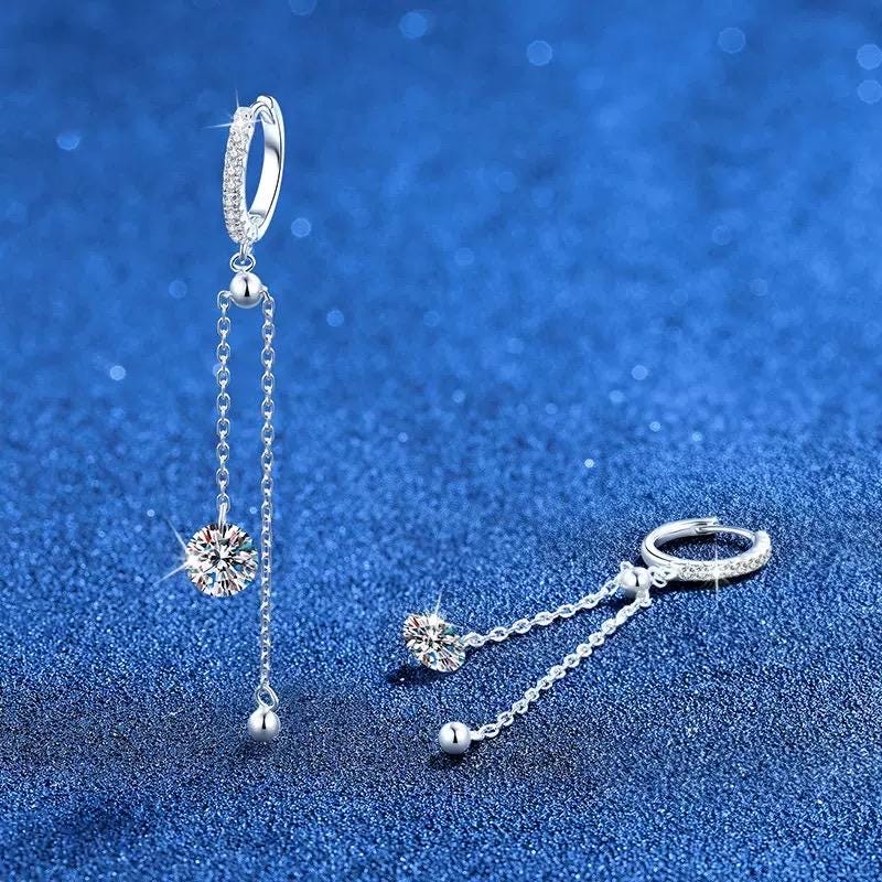 Sterling silver huggie hoops with long moissanite chain drops