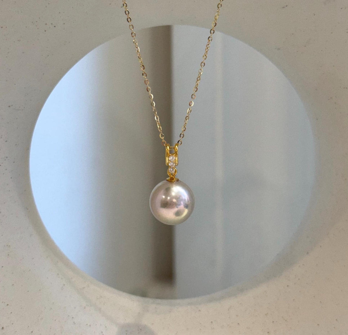Rose pink Edison pearl pendant necklace with mirror luster and gold-plated S925 sterling silver.