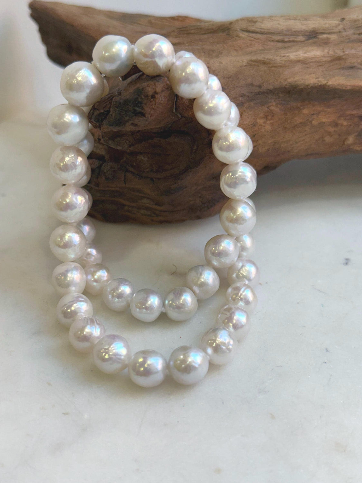 Freshwater pearl necklace showcasing its white iridescent color