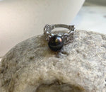 Mirror-luster Tahitian pearl ring in black platinum with a gold-plated setting