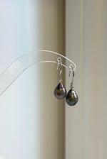 Elly’s sterling silver earrings featuring 9.6mm Tahitian pearls in hunter brown.