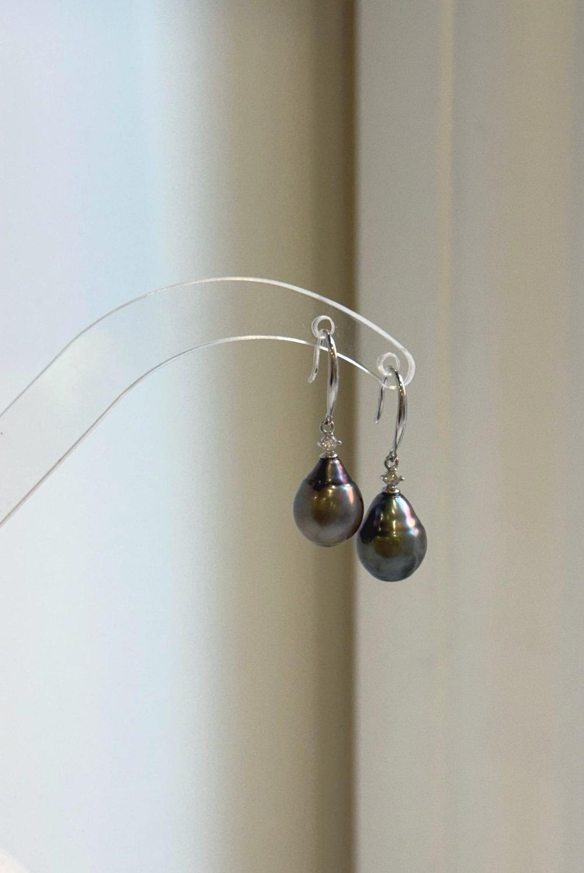 Elly’s sterling silver earrings featuring 9.6mm Tahitian pearls in hunter brown.