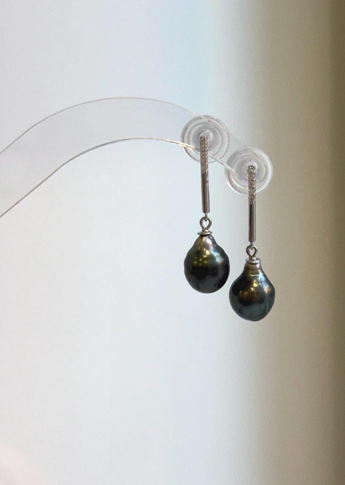 Sterling silver pearl dangle earrings showcasing the lustre of 9mm Hunter Ocean pearls.