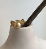 South Sea pearl ring pairing a rich tea-gold pearl with an adjustable lace-design band in gold-plated sterling silver.