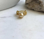 A deep tea-gold 10.2mm pearl paired with a gold-plated S925 sterling silver band in a minimalist lace design.
