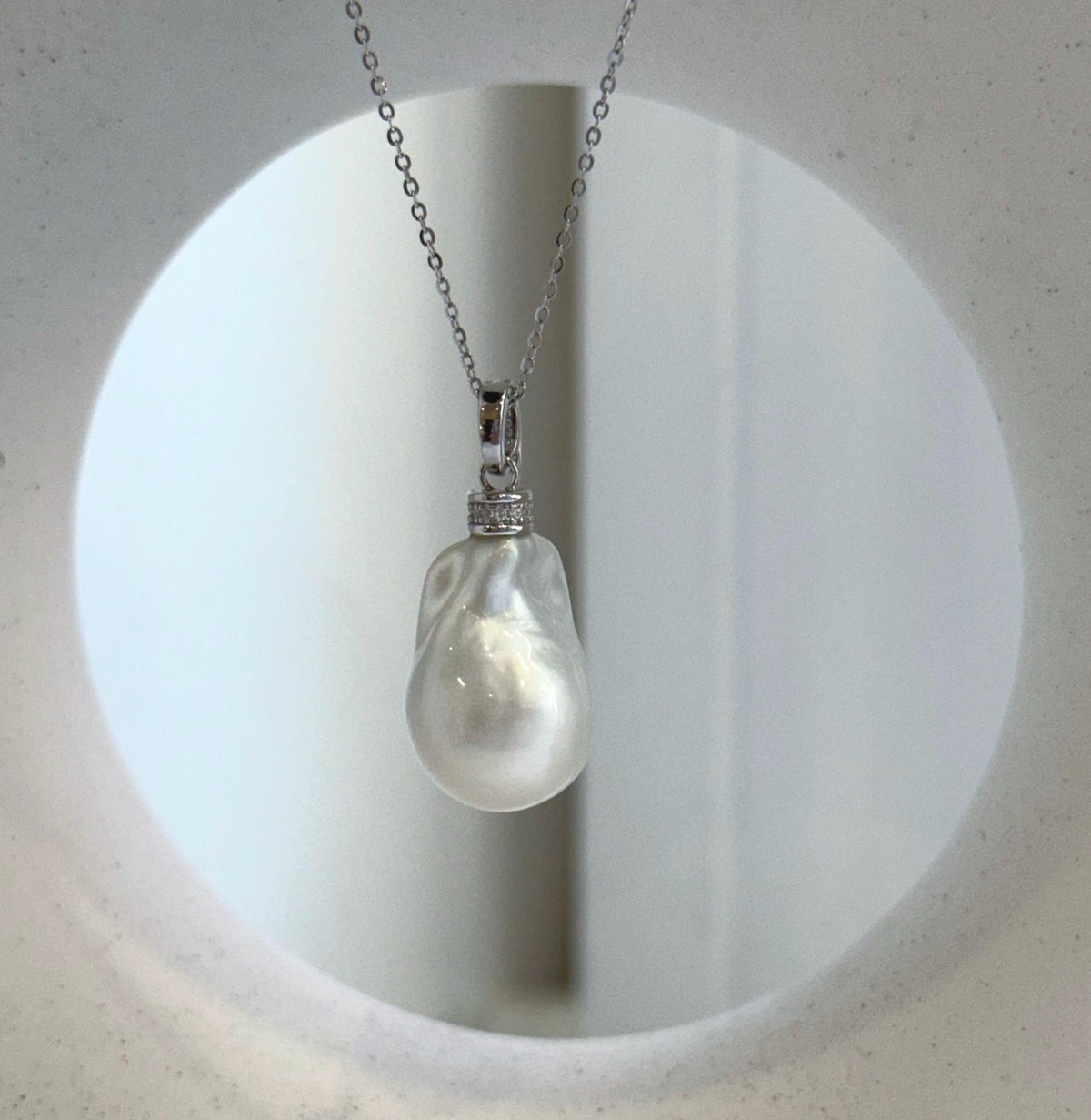 Elly’s Australian pearl pendant with a 3.1cm total height and sterling silver setting.