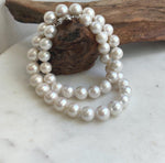 Round white Edison pearls with extreme mirror luster on a 19.1-inch necklace.