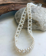 White pearl woven choker necklace with an S925 sterling silver clasp.