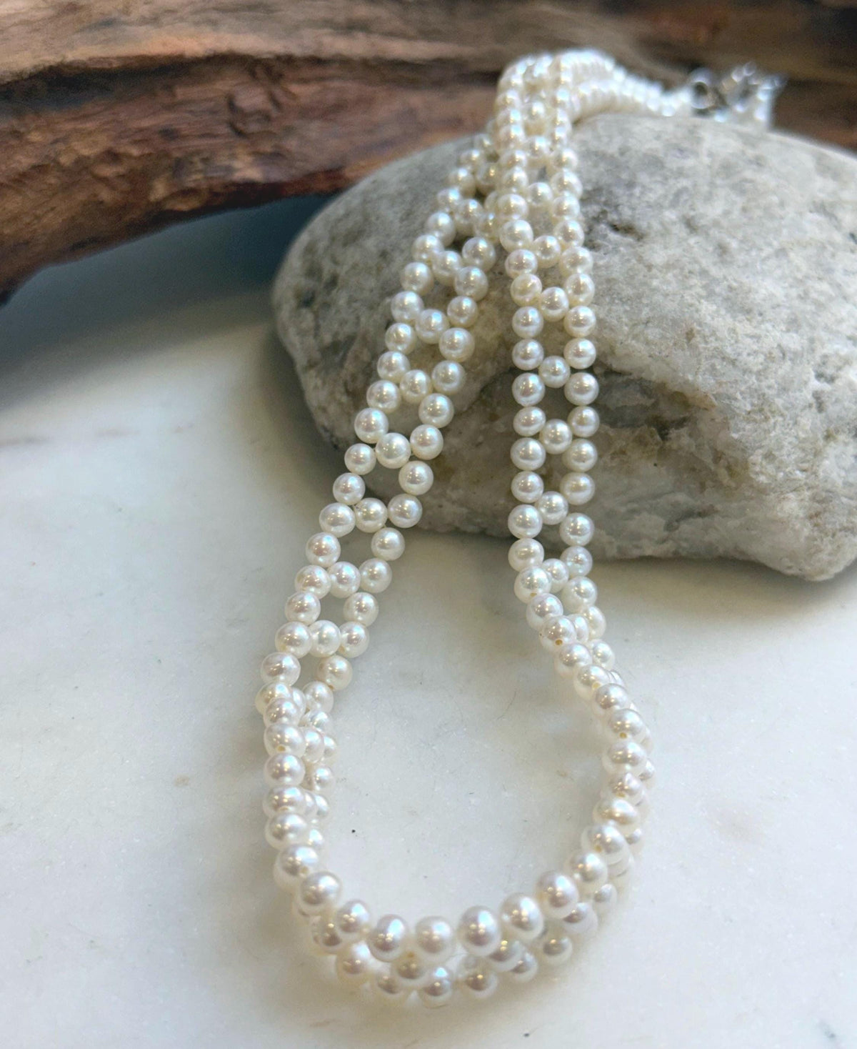 White pearl woven choker necklace with an S925 sterling silver clasp.