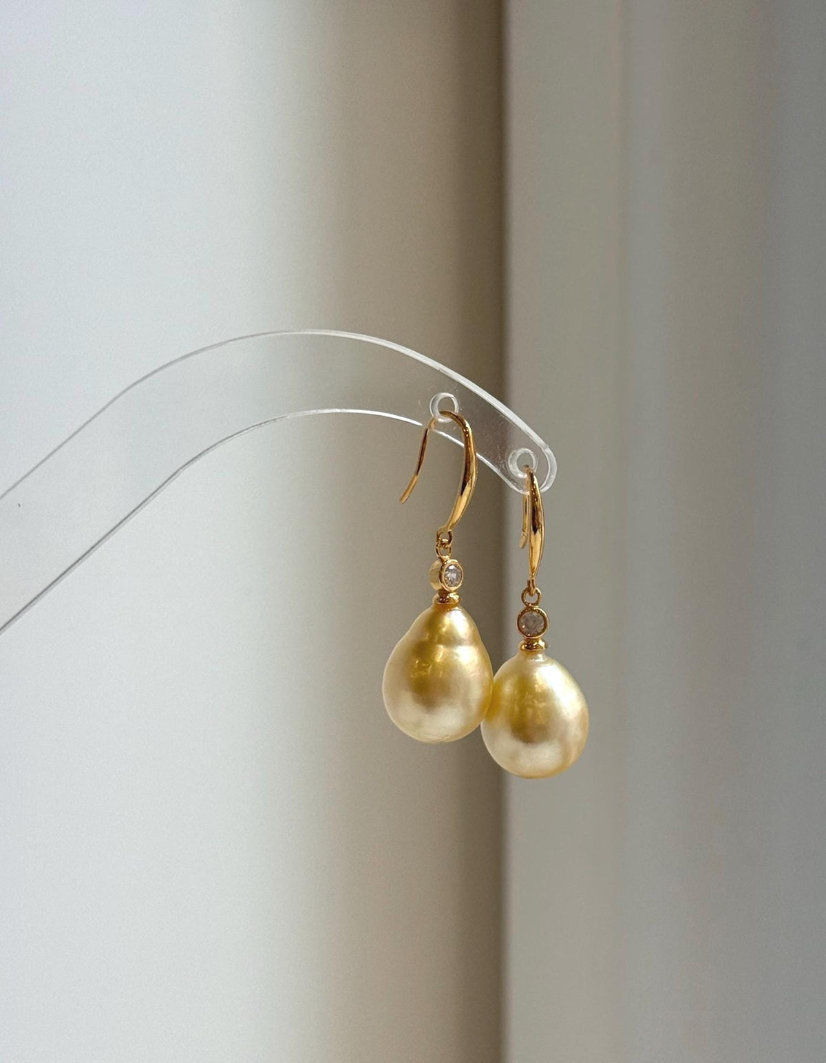 11.6mm golden South Sea pearl hook earrings in S925 sterling silver.