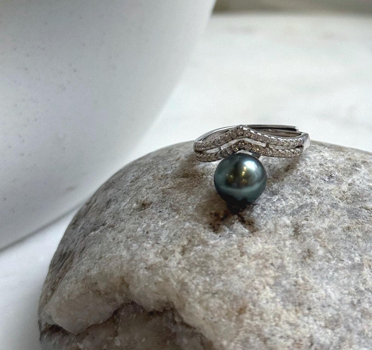 Tahitian saltwater pearl with blue-green overtones on a sparkling silver band.