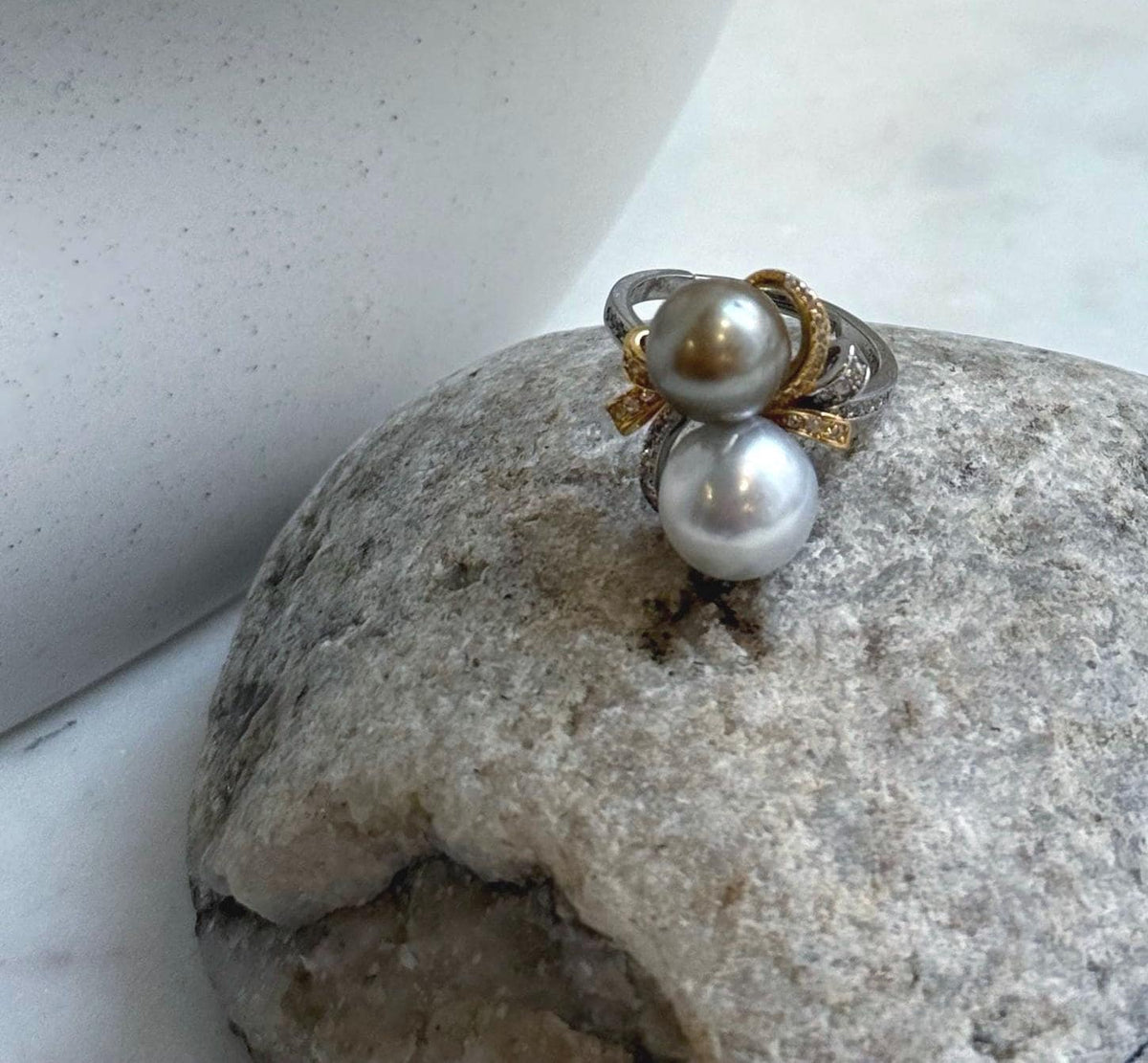 Adjustable S925 sterling silver ring featuring two lustrous Tahitian pearls.