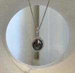 Elly’s Tahitian keshi pearl pendant with a sparkling halo and S925 sterling silver setting.