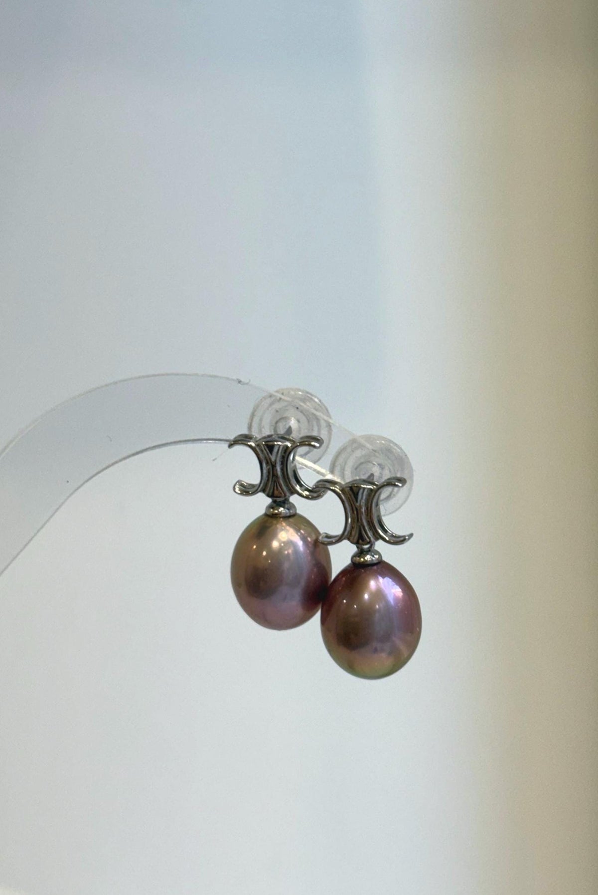 S925 sterling silver earrings featuring lustrous lavender freshwater pearls.