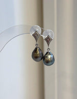 Tahitian pearl drop earrings with peacock green tones and geometric S925 sterling silver studs.